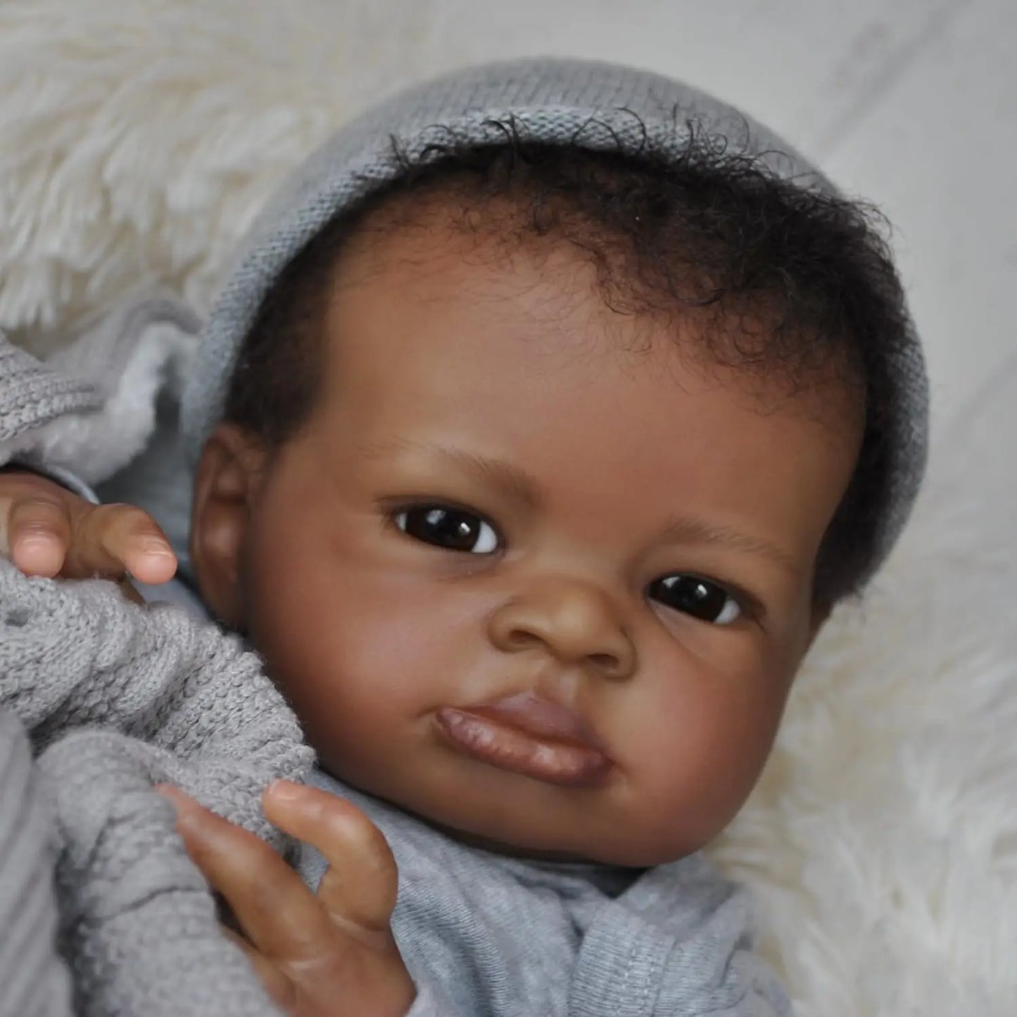 Realistic Reborn Baby Doll, 19-Inch African American Lifelike Boy | Real-Life Feel, Hand-Rooted Hair, Handmade Newborn, Weighted Body, Soft & Cuddly, Accessories Included, Gift Box,Ages 3+