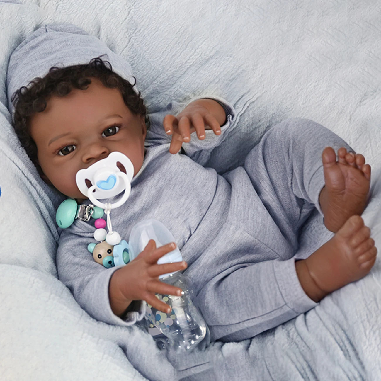 Realistic Reborn Baby Doll, 19-Inch African American Lifelike Boy | Real-Life Feel, Hand-Rooted Hair, Handmade Newborn, Weighted Body, Soft & Cuddly, Accessories Included, Gift Box,Ages 3+