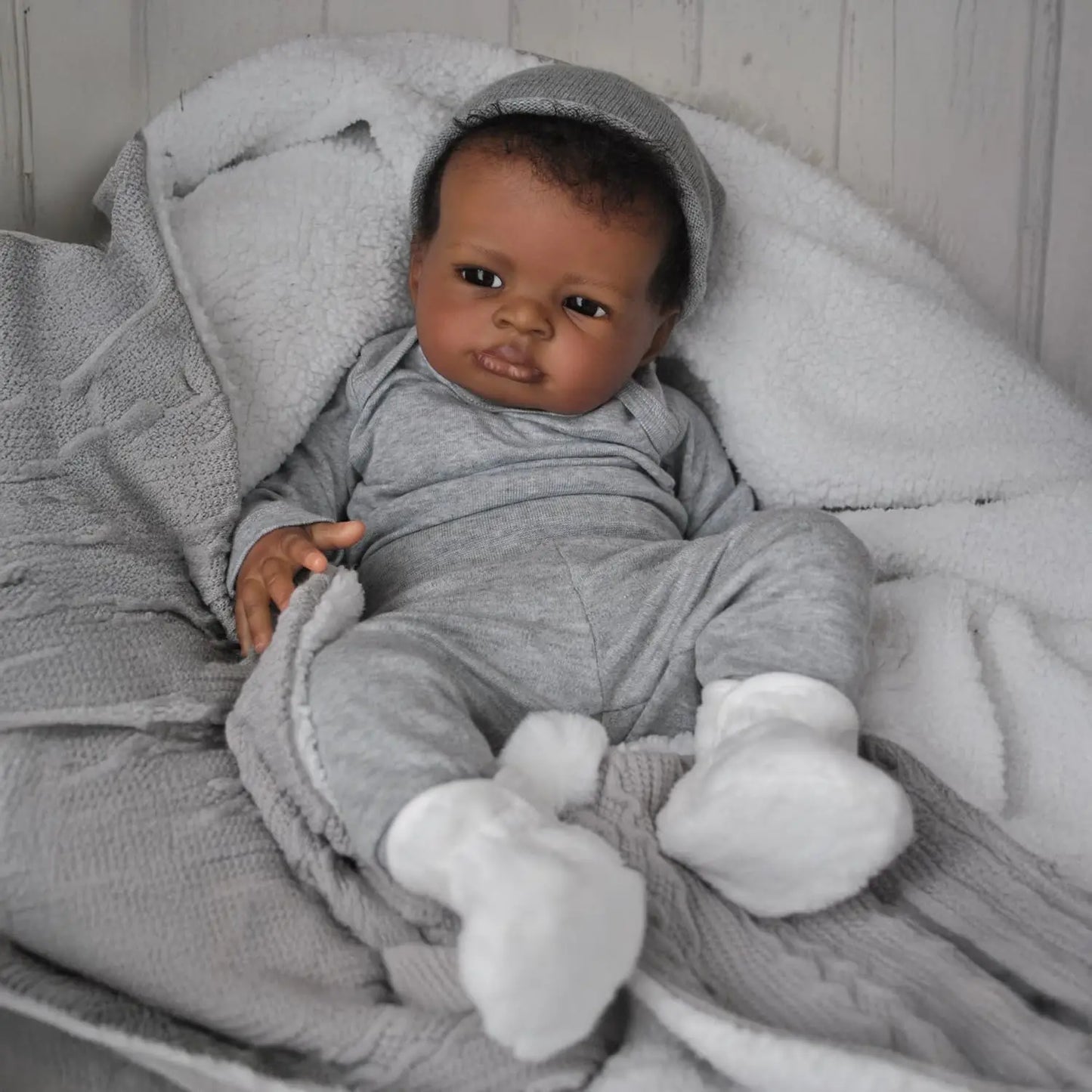 Realistic Reborn Baby Doll, 19-Inch African American Lifelike Boy | Real-Life Feel, Hand-Rooted Hair, Handmade Newborn, Weighted Body, Soft & Cuddly, Accessories Included, Gift Box,Ages 3+